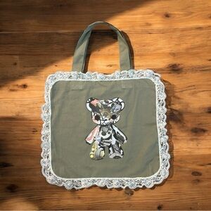 Custom green tote bag featuring my original artwork the robotic teddy bear